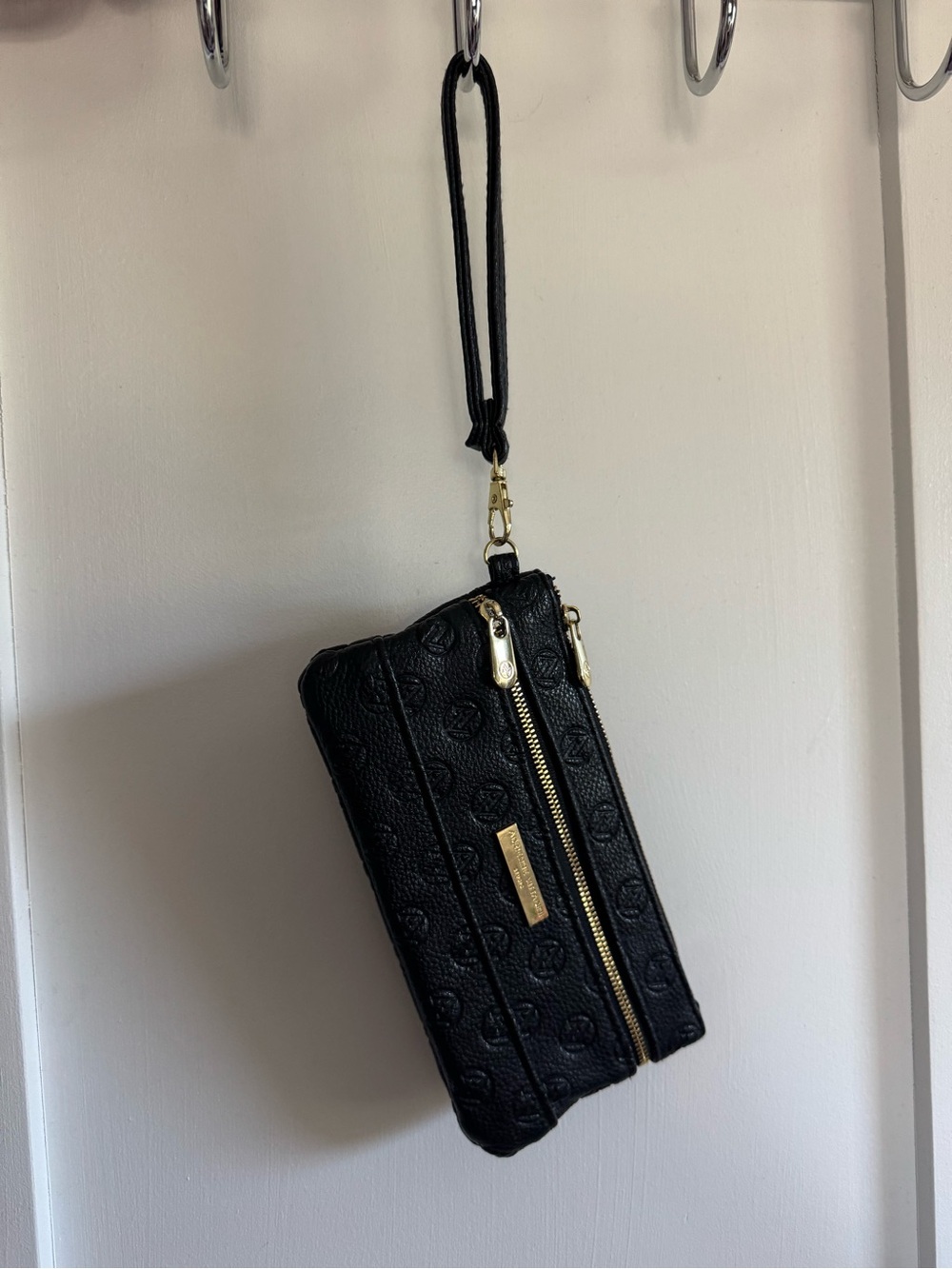 Adrienne Vittadini Black Embossed Wristlet with Gold Accents